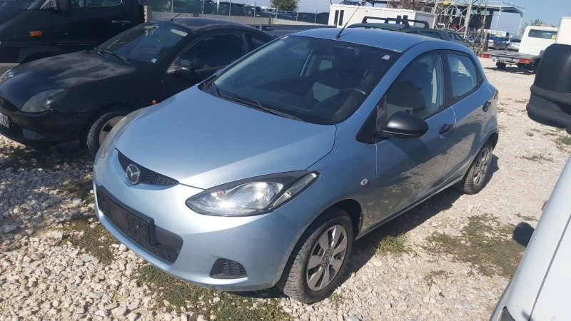 Mazda 2 1.3i, снимка 4 - Автомобили и джипове - 47551579