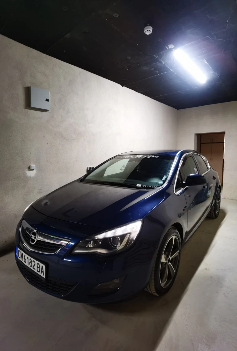Opel Astra J Sport Tourer, снимка 7 - Автомобили и джипове - 51545456
