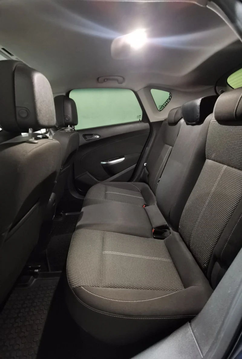 Opel Astra J Sport Tourer, снимка 10 - Автомобили и джипове - 51545456