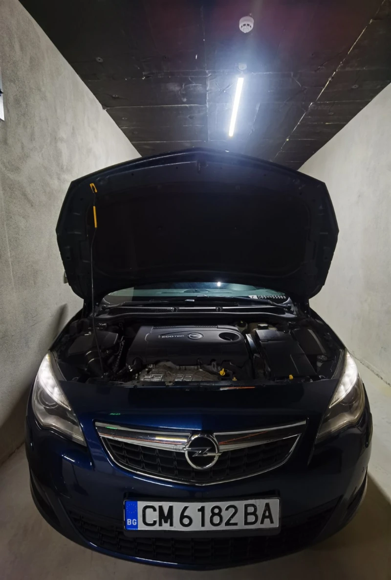 Opel Astra J Sport Tourer, снимка 6 - Автомобили и джипове - 51545456