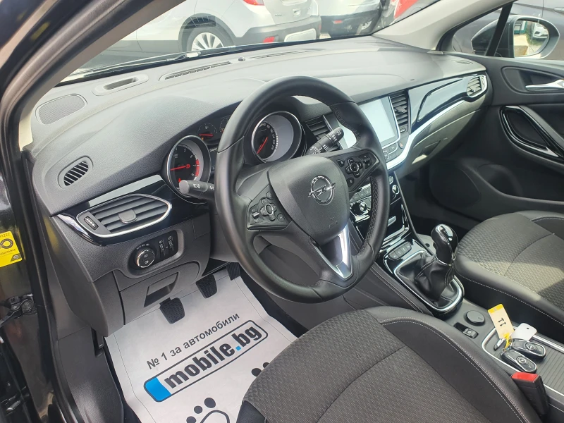 Opel Astra 1.0i-turbo 105k.с navi, kamera , key less, led , снимка 14 - Автомобили и джипове - 51468948