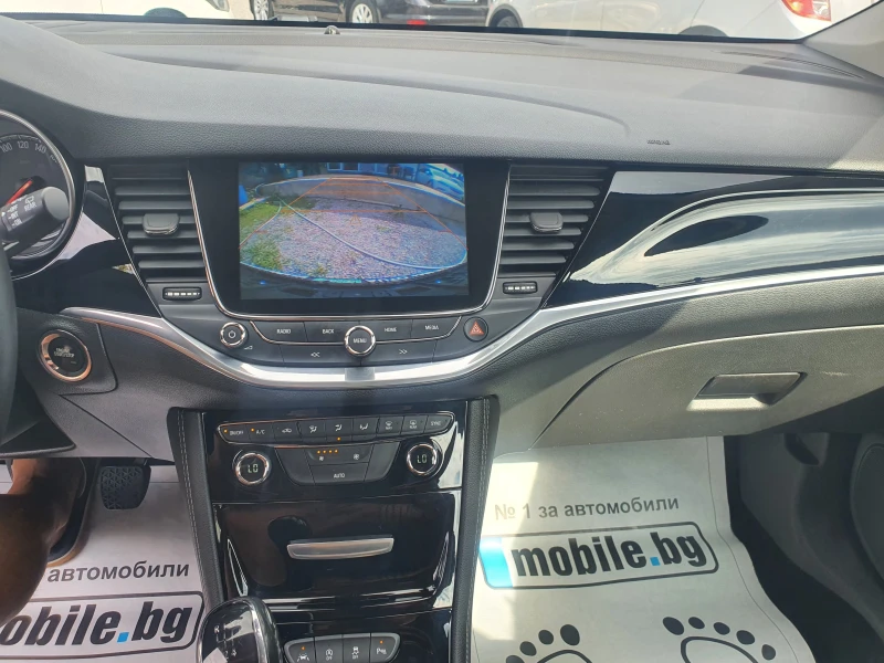 Opel Astra 1.0i-turbo 105k.с navi, kamera , key less, led , снимка 12 - Автомобили и джипове - 51468948