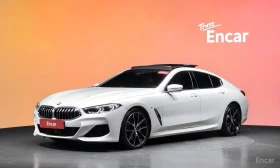 ������ BMW 840