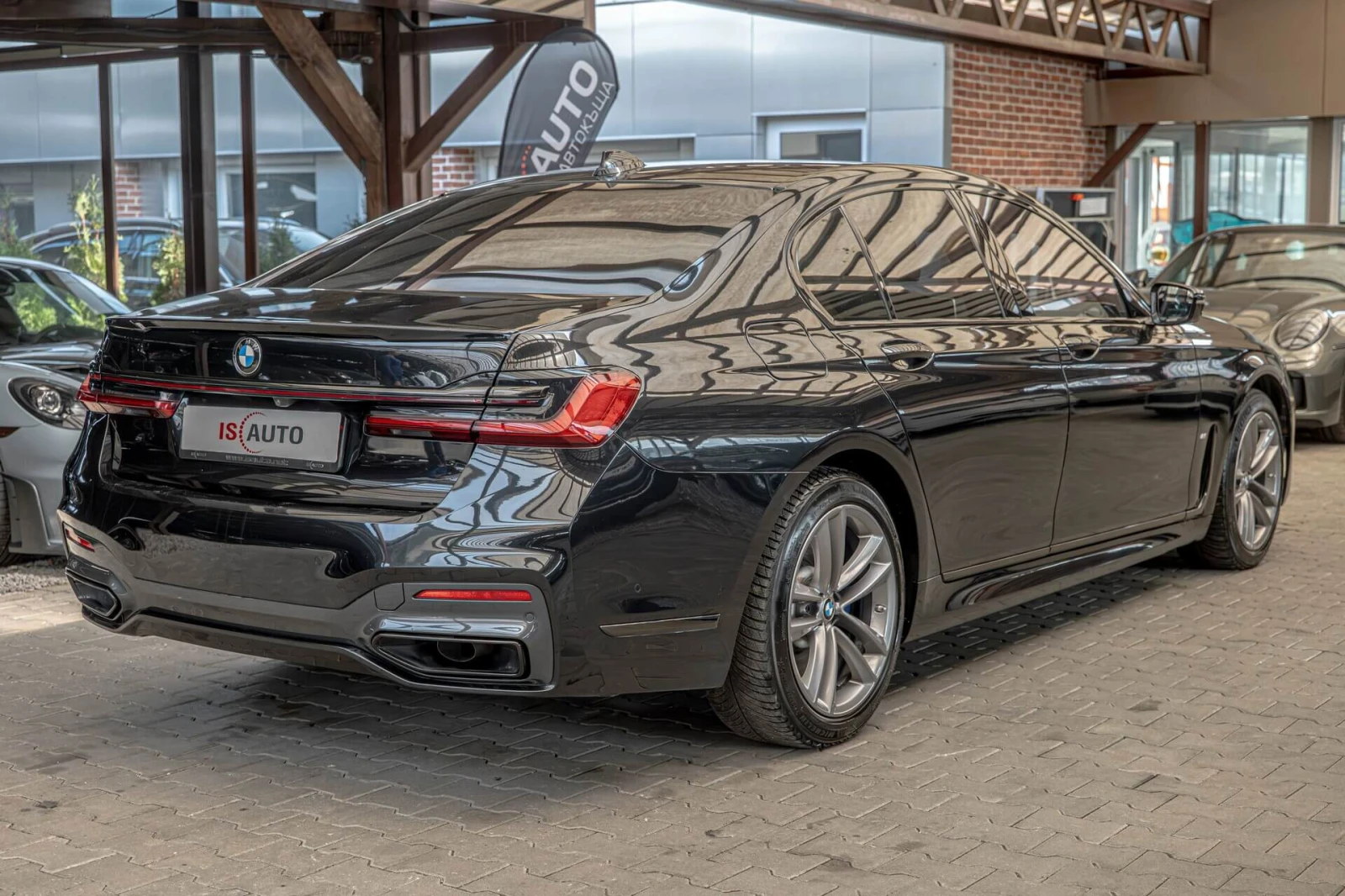 BMW 740 xDrive/M-Pack/Distronic/Laser/Harman Kardon/HuD/Ка, снимка 6 - Автомобили и джипове - 53877605