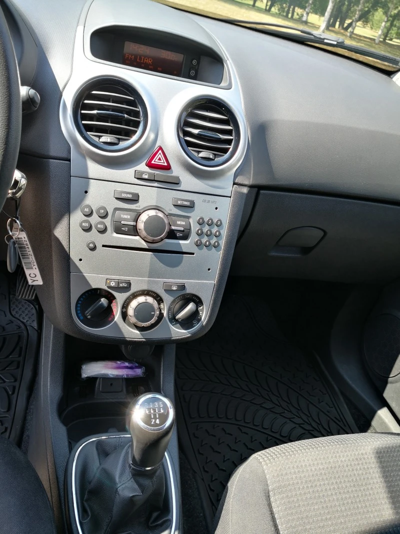 Opel Corsa, снимка 7 - Автомобили и джипове - 47619424