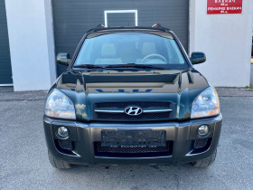 Hyundai Tucson 2.0 CRDI 4X4, снимка 2 - Автомобили и джипове - 45470411