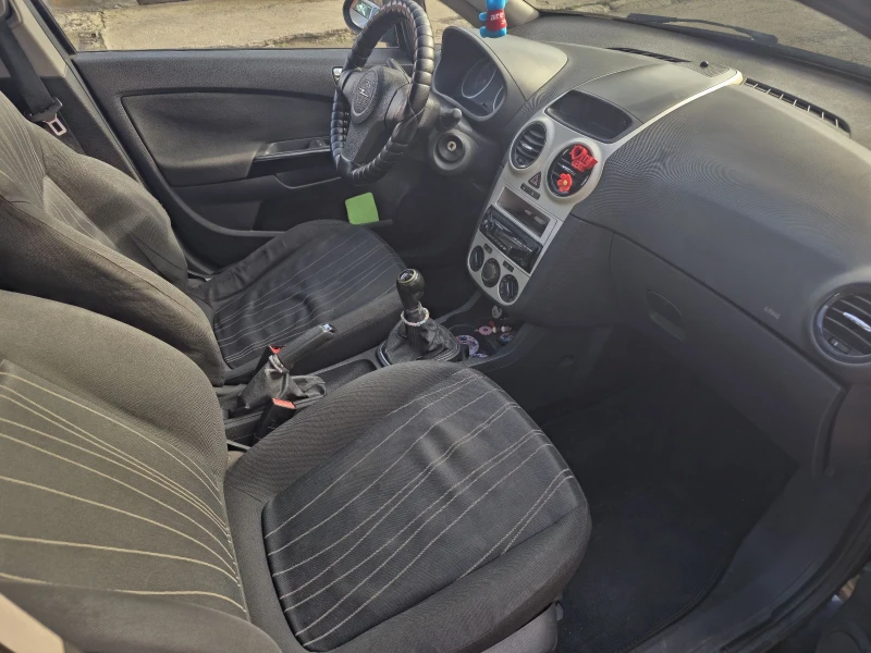 Opel Corsa, снимка 8 - Автомобили и джипове - 52953561