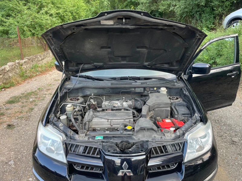 Mitsubishi Outlander 2.0I 4х4, снимка 14 - Автомобили и джипове - 51895615