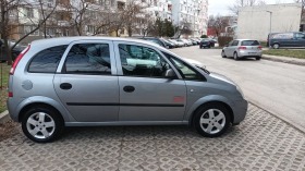 Opel Meriva 1.4 90кс., снимка 10 - Автомобили и джипове - 45249121