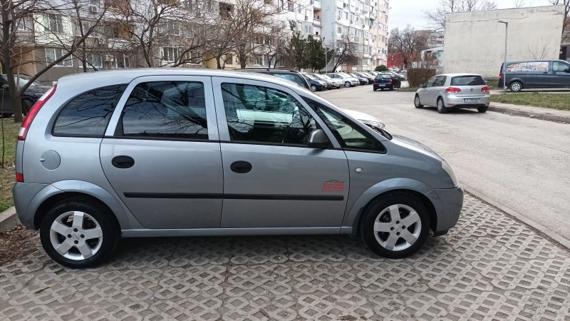 Opel Meriva 1.4 90кс., снимка 10 - Автомобили и джипове - 46366920