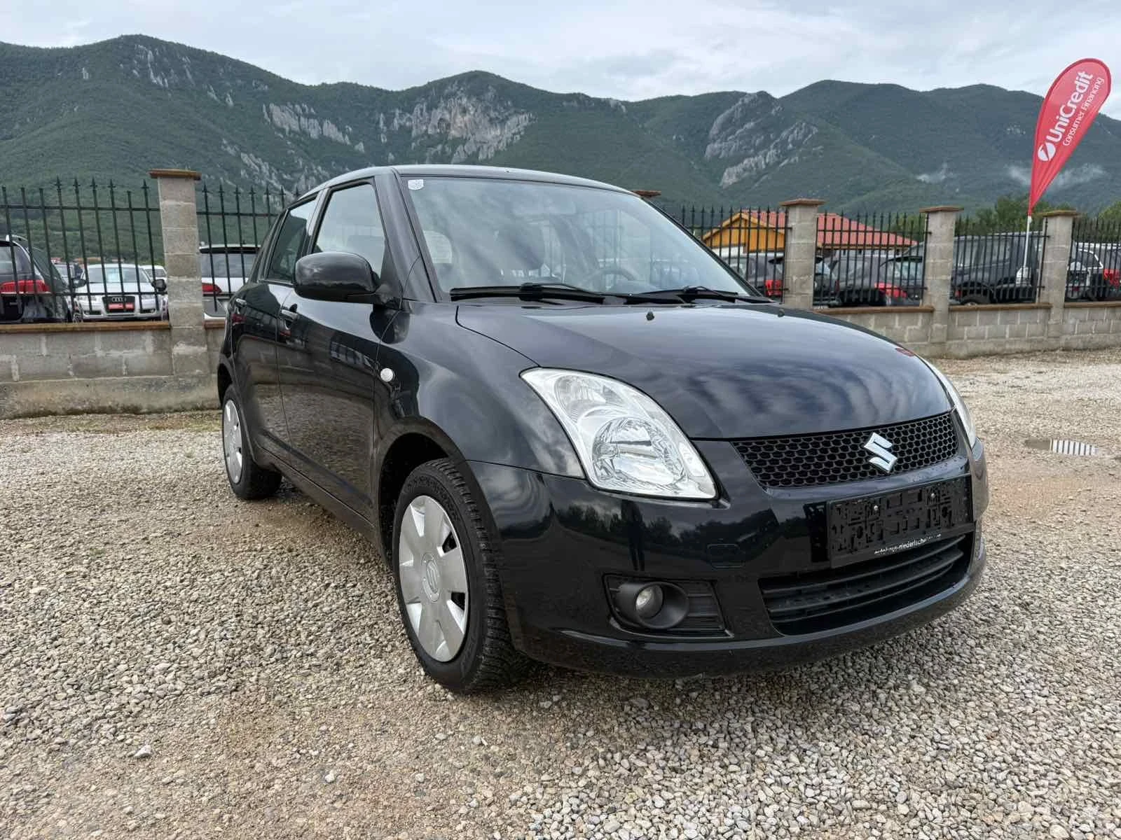 Suzuki Swift 1.3 I 4x4 КЛИМА, снимка 9 - Автомобили и джипове - 54791018