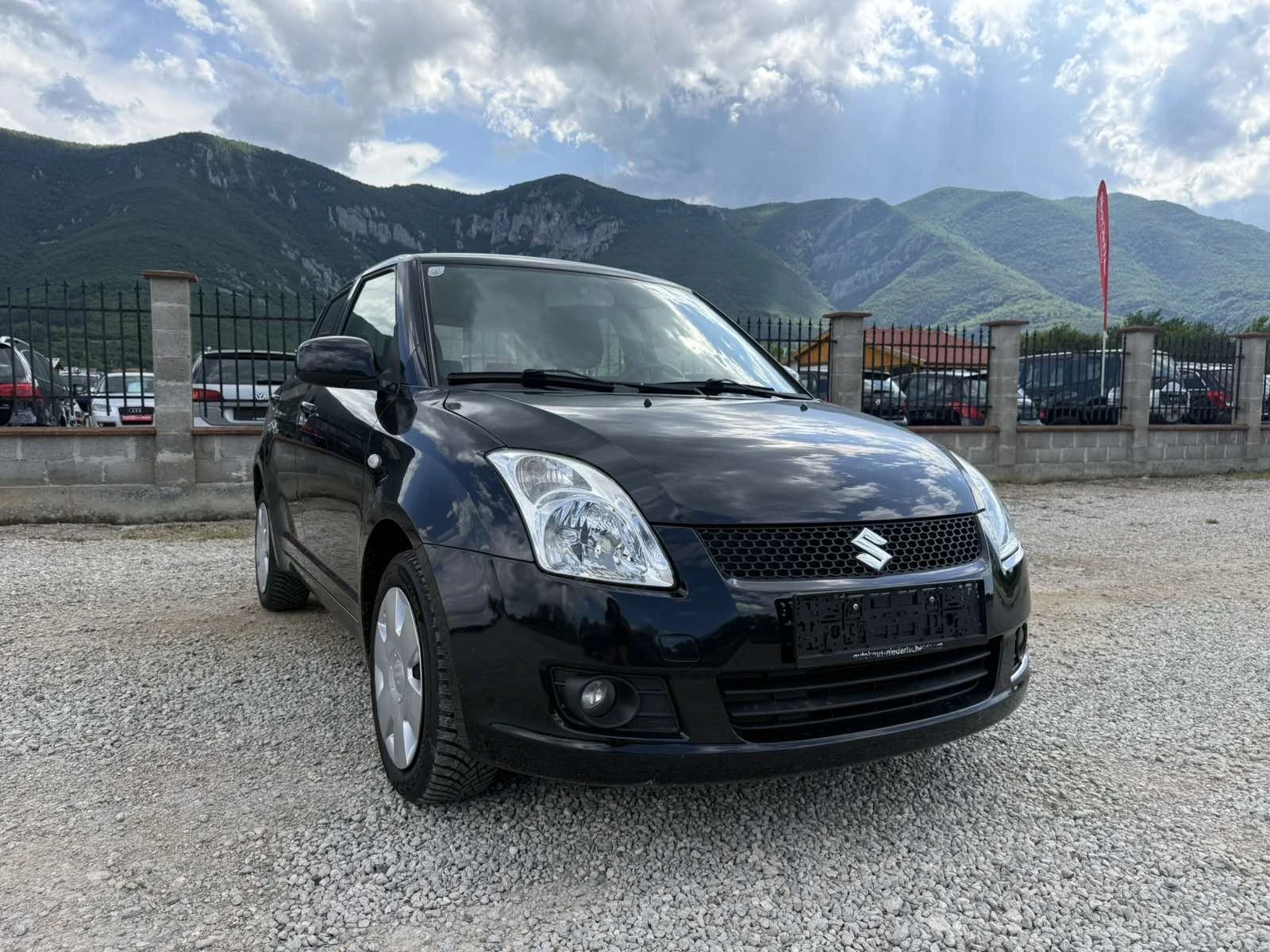 Suzuki Swift 1.3 I 4x4 КЛИМА, снимка 3 - Автомобили и джипове - 54791018