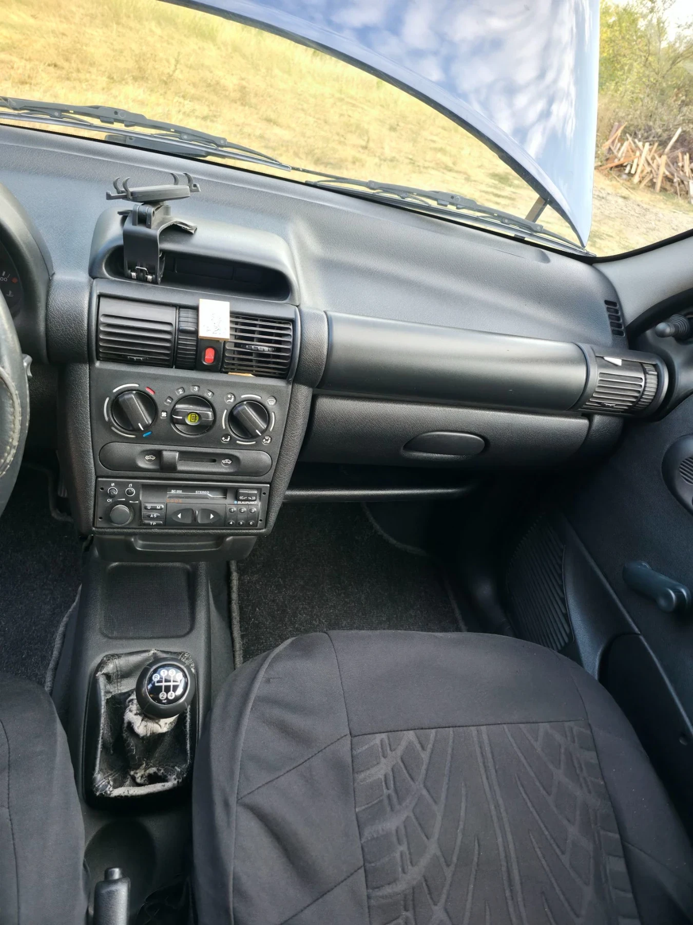 Opel Corsa 1.0i, 12V, снимка 12 - Автомобили и джипове - 55805055
