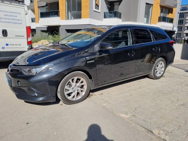 Toyota Auris Hybrid, снимка 13 - Автомобили и джипове - 47556626