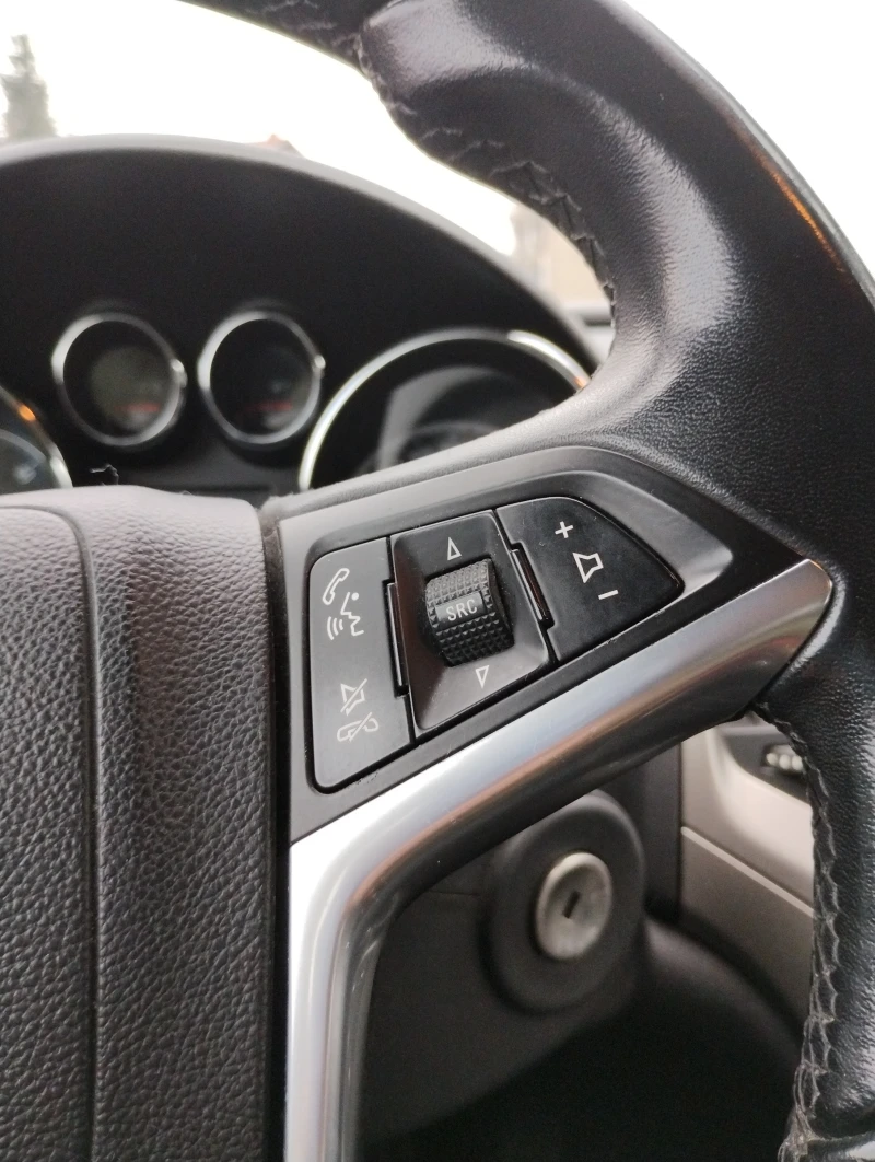 Opel Astra Sports Tourer, снимка 8 - Автомобили и джипове - 52863906