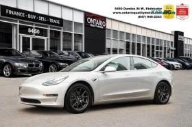 ������ Tesla Model 3
