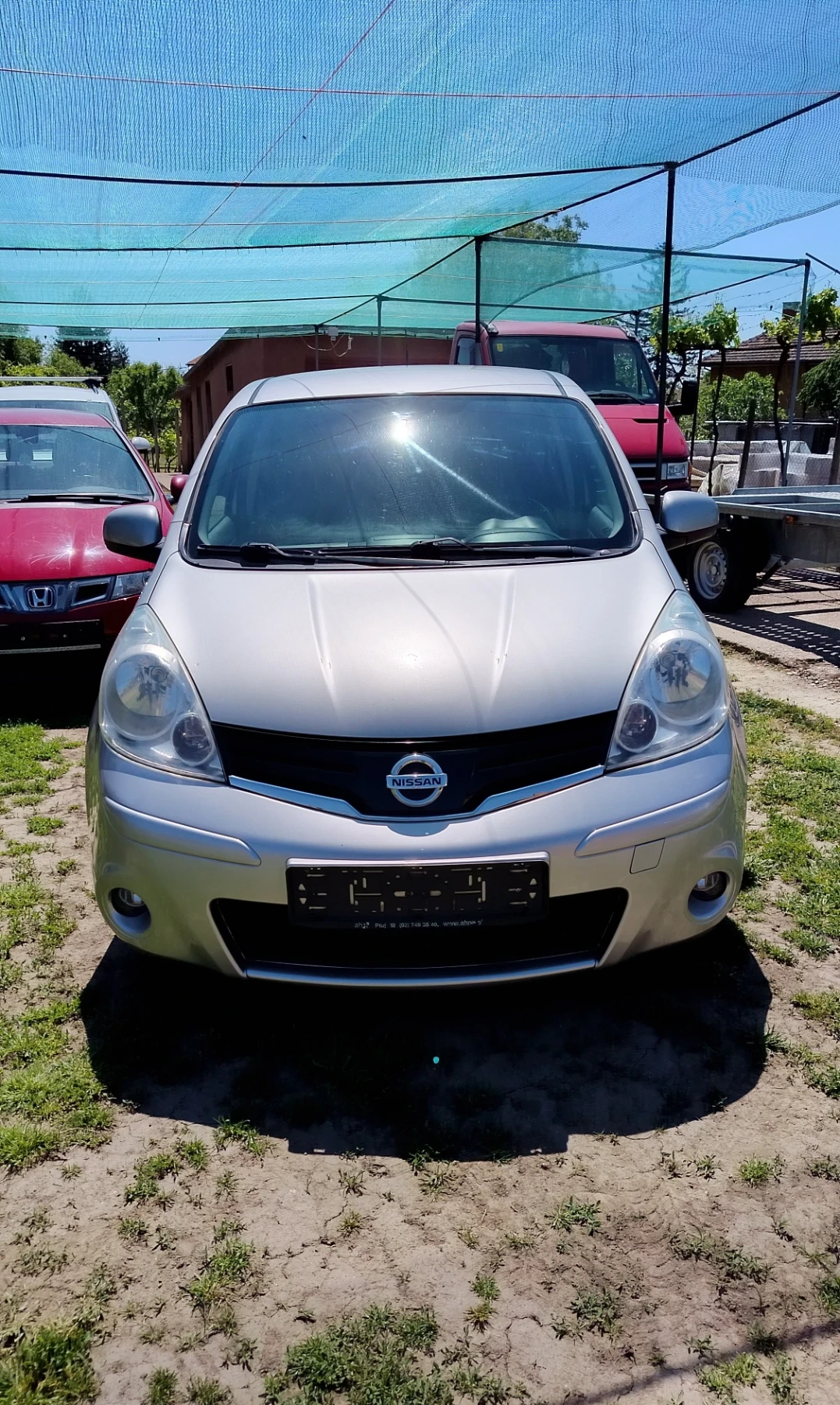 Nissan Note 1.4i 88кс, снимка 6 - Автомобили и джипове - 54852581