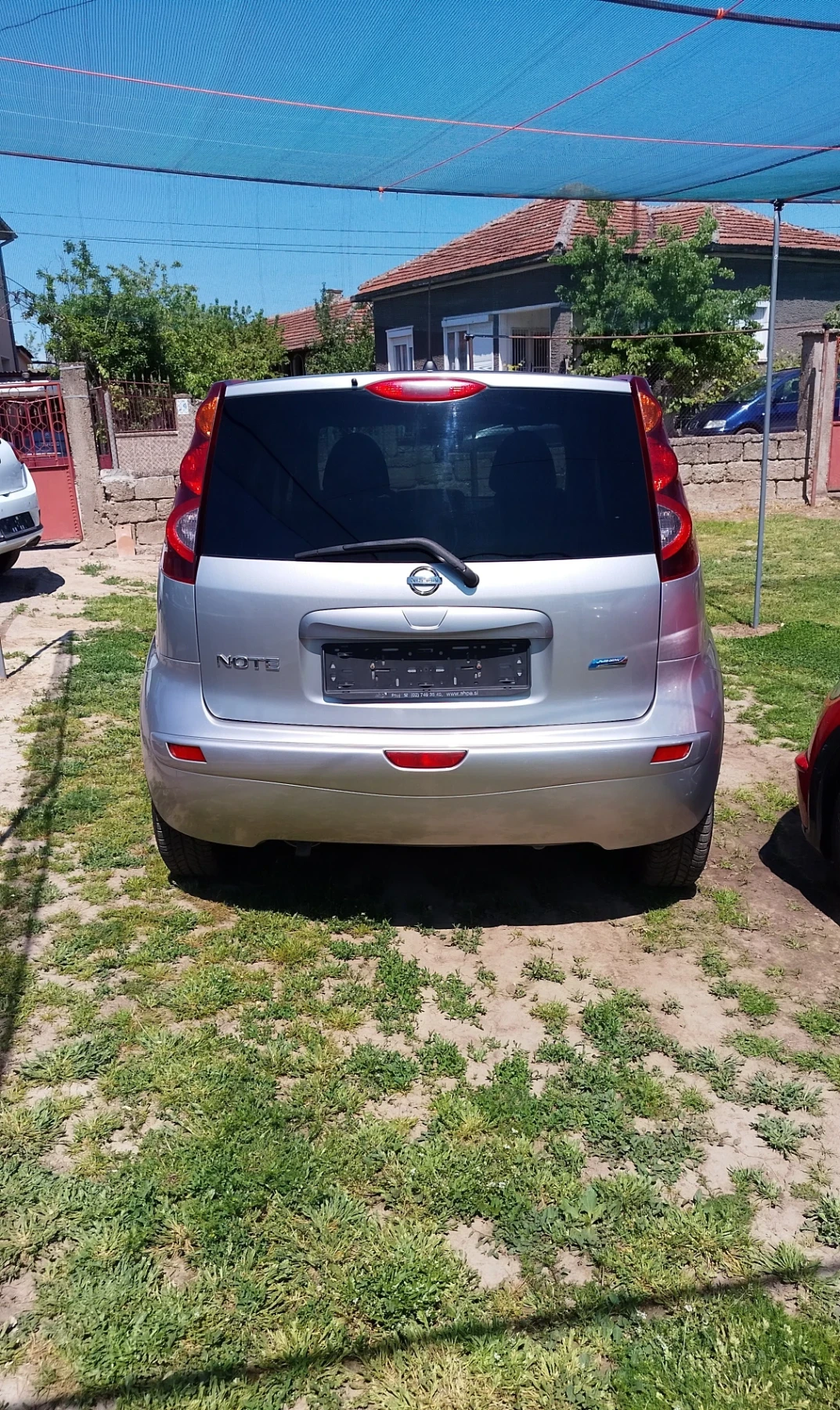 Nissan Note 1.4i 88кс, снимка 7 - Автомобили и джипове - 54852581