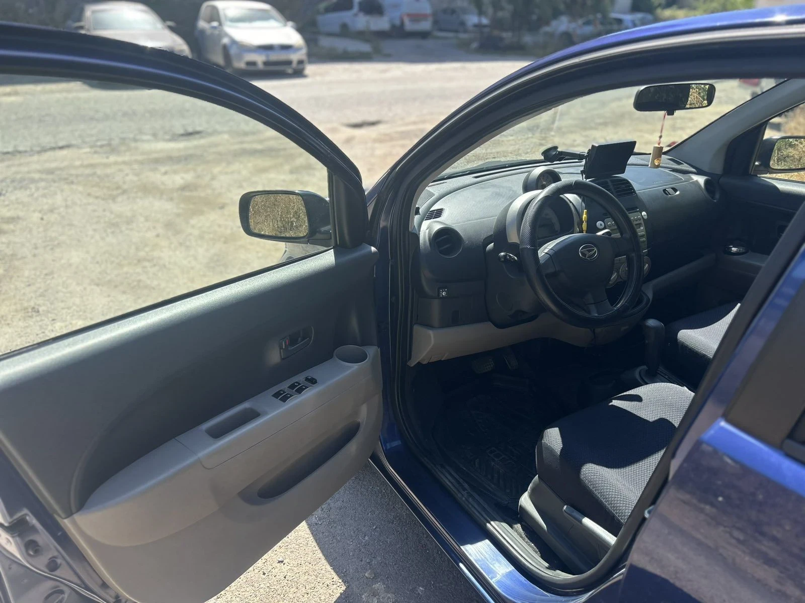 Daihatsu Sirion, снимка 9 - Автомобили и джипове - 55674630