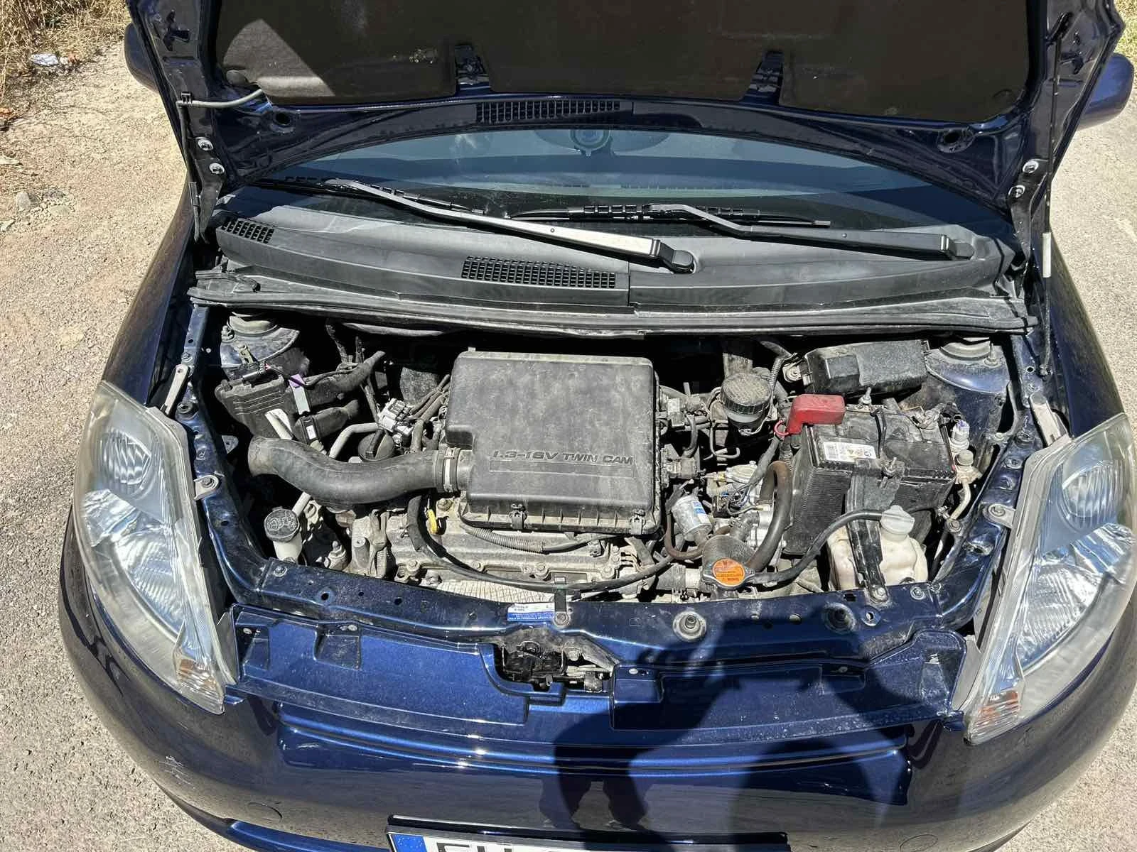 Daihatsu Sirion, снимка 14 - Автомобили и джипове - 55674630