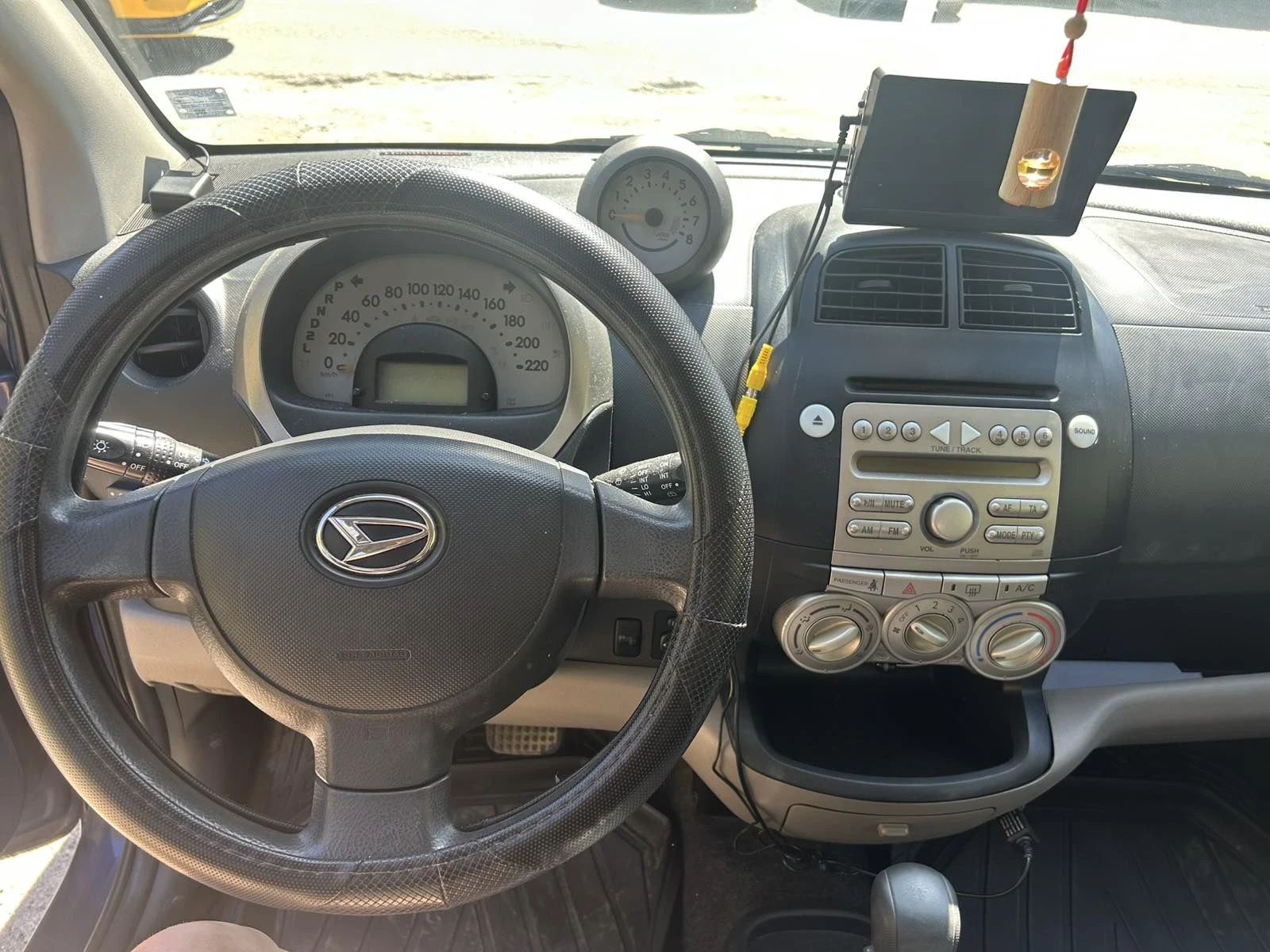 Daihatsu Sirion, снимка 16 - Автомобили и джипове - 55674630