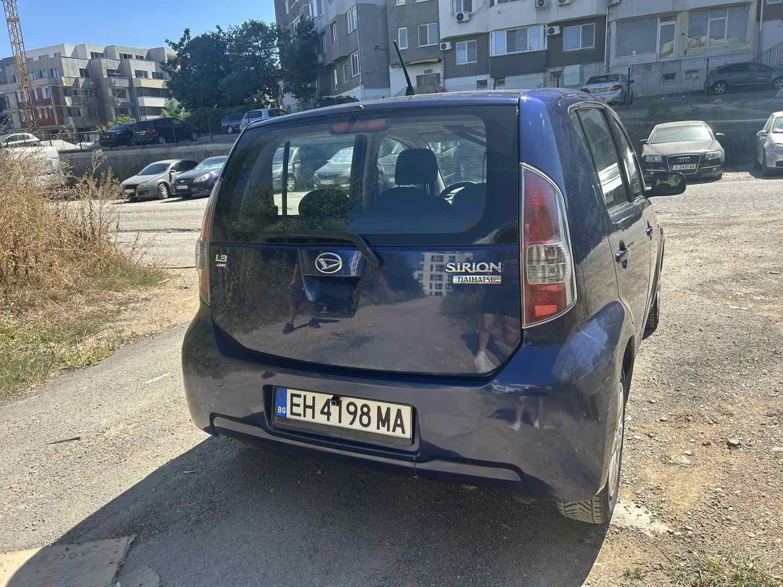 Daihatsu Sirion, снимка 8 - Автомобили и джипове - 55674630