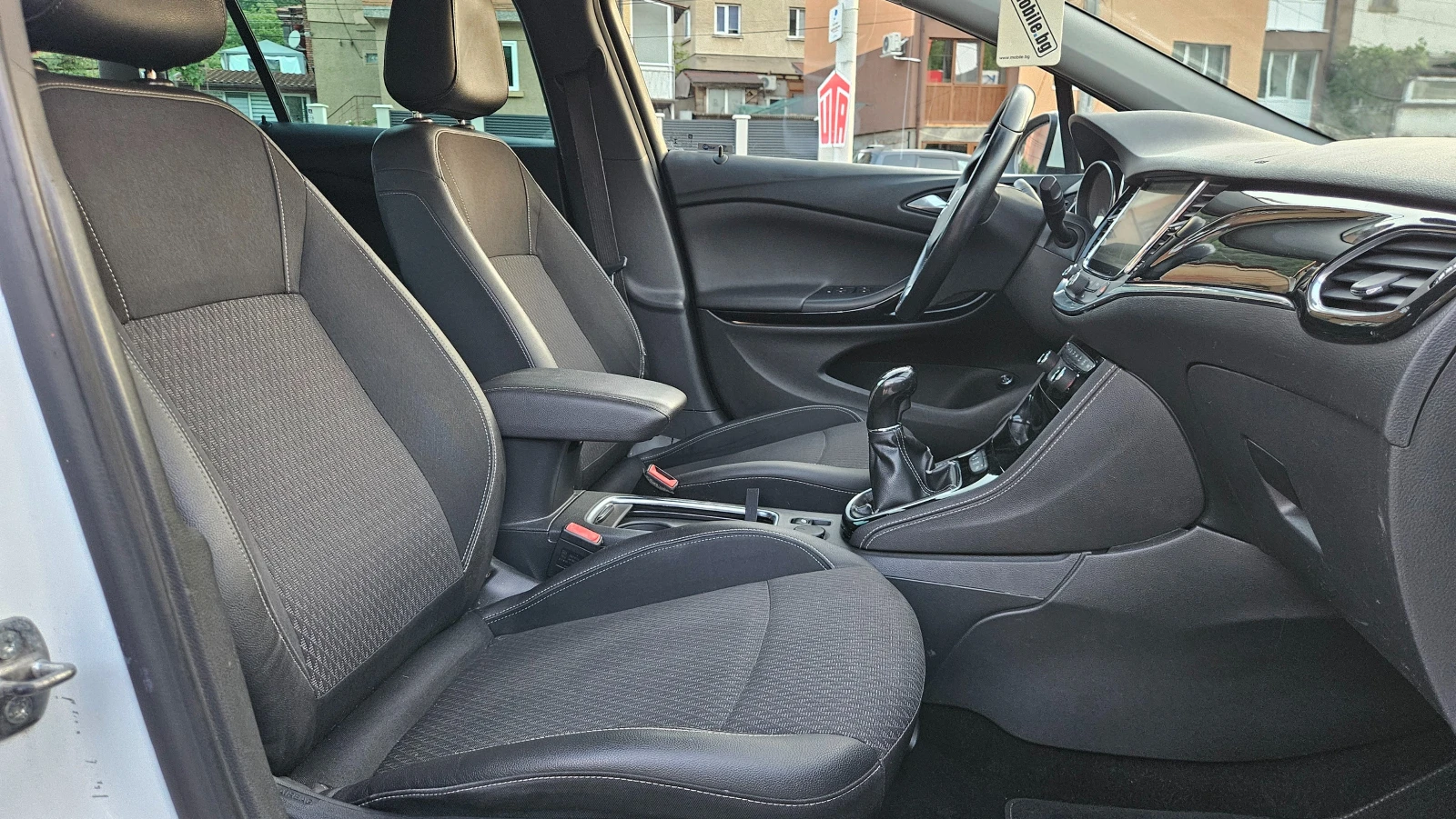 Opel Astra 1.6 CDTI NAVIG/KLIMATRONIK/6skorosti/ COSMO, снимка 13 - Автомобили и джипове - 55681600