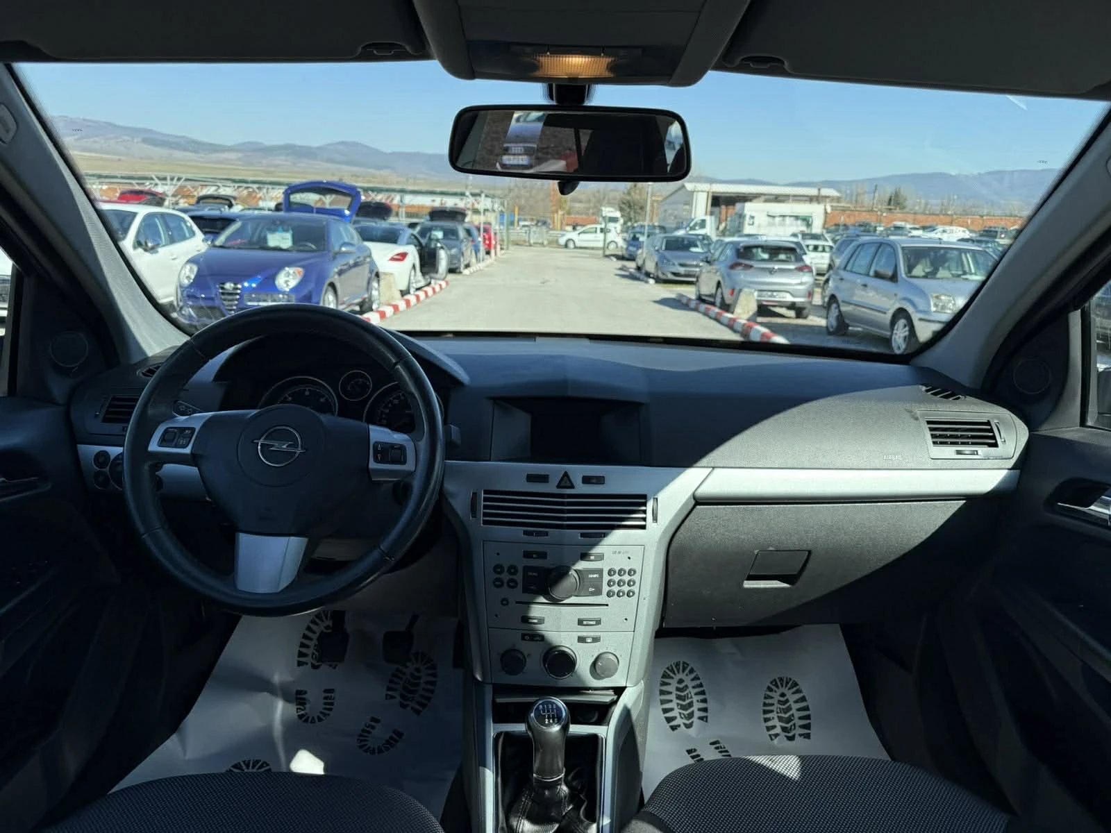 Opel Astra, снимка 12 - Автомобили и джипове - 53715649