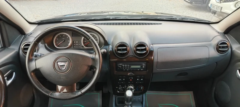 Dacia Duster 1.5dci-108к.с/КЛИМАТИК/EURO 5B!!! , снимка 13 - Автомобили и джипове - 51076811