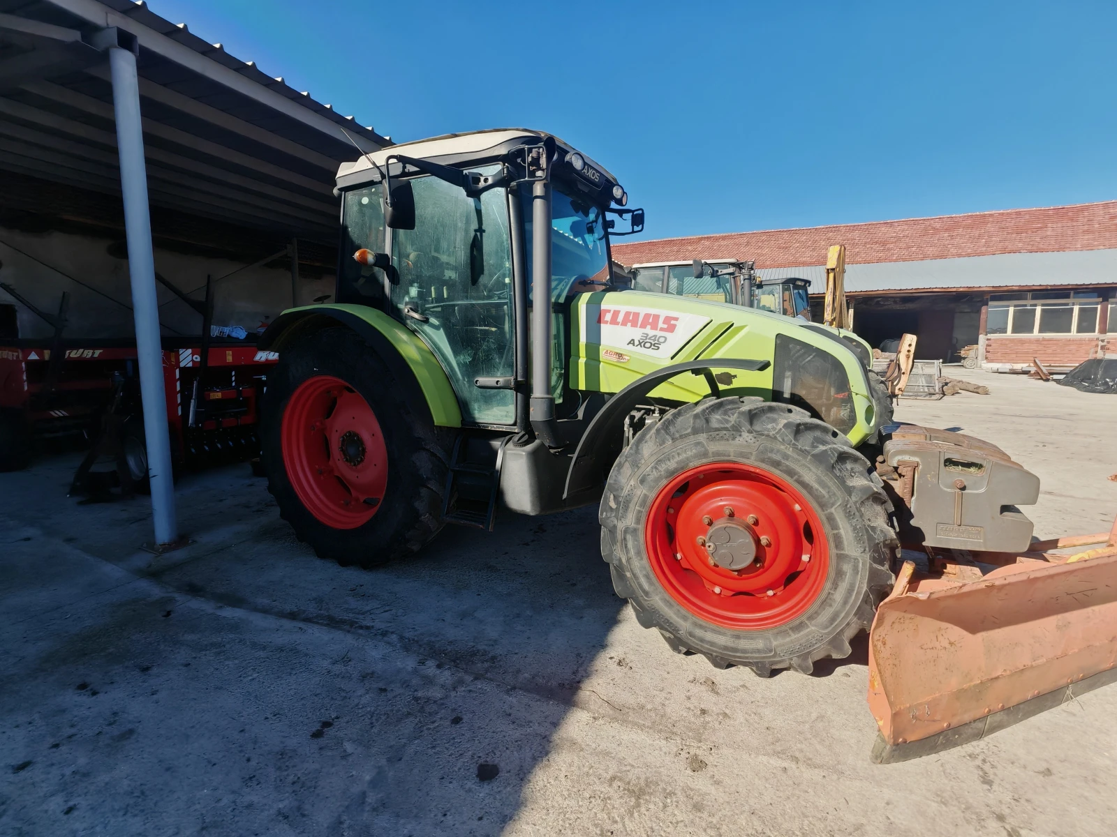 Трактор Claas Axos 340 - изображение 2