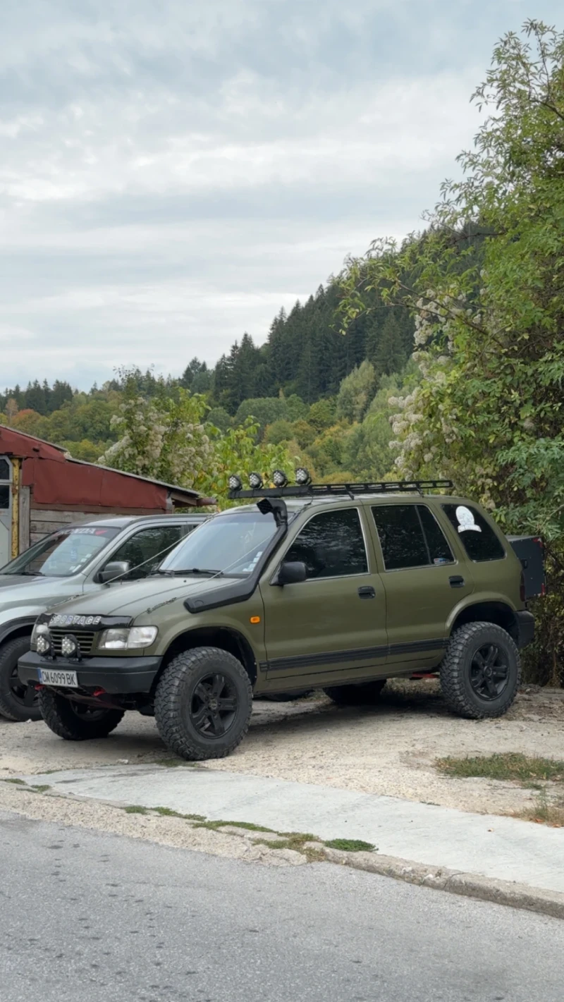 Kia Sportage, снимка 7 - Автомобили и джипове - 52801408