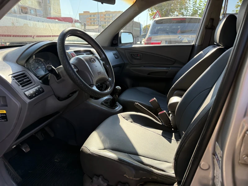 Hyundai Tucson 2.0crdi/4wd, снимка 9 - Автомобили и джипове - 51519344