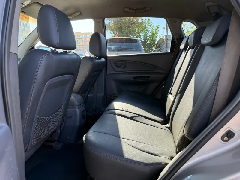Hyundai Tucson 2.0crdi/4wd, снимка 11 - Автомобили и джипове - 51519344