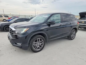 ������ Honda Passport