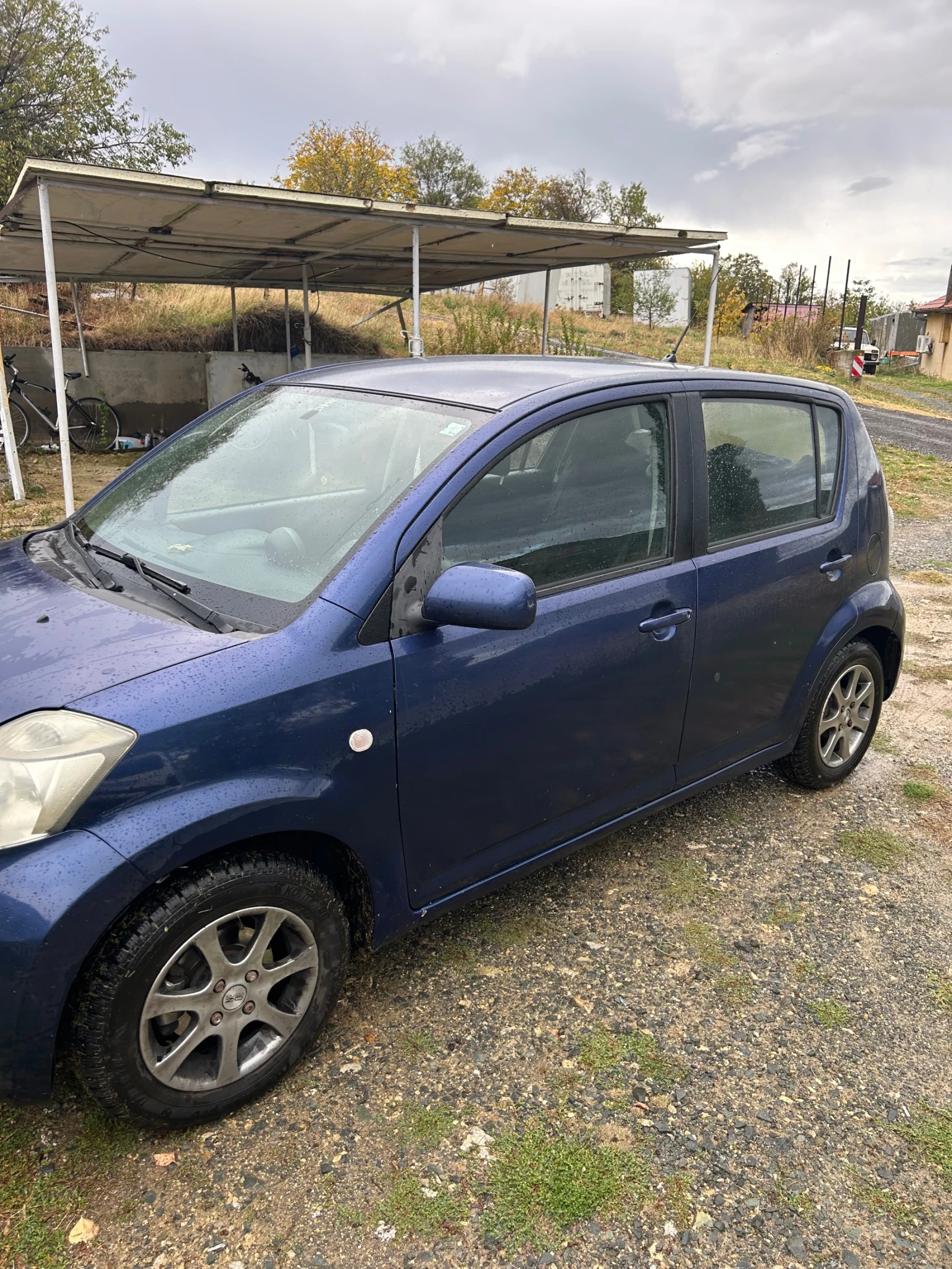 Daihatsu Sirion 1.3 4x4, снимка 3 - Автомобили и джипове - 56514121