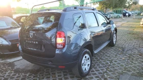 Dacia Duster 1.6i 4x4 Laureate Edition, снимка 4