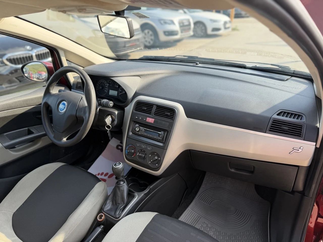 Fiat Punto 1.3 MultiJet, снимка 16 - Автомобили и джипове - 55565628