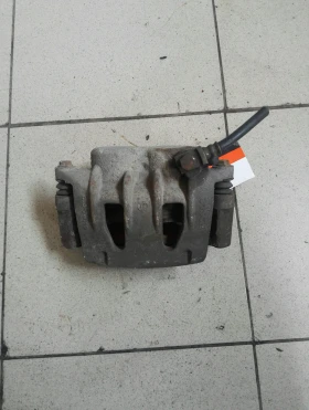 Спирачен апарат преден ляв Форд Транзит 2.4 16В