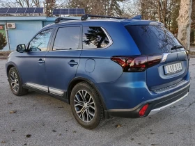 Mitsubishi Outlander 2.2D 4WD* Сервизна история* Един собств.* 7-местен, снимка 3