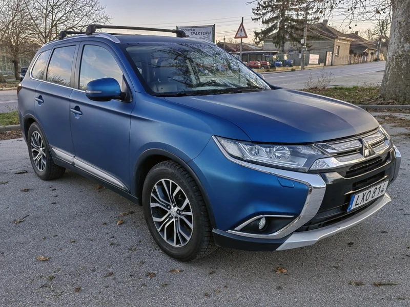 Mitsubishi Outlander 2.2D 4WD* Сервизна история* Един собств.* 7-местен, снимка 1 - Автомобили и джипове - 48534991