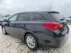 Toyota Auris 1.8 HYBRID / AVTOMAT / NAVI / CAMERA / PANORAMA - 15500 лв. - 23425022 6