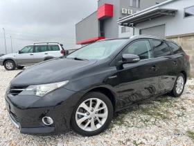 Toyota Auris 1.8 HYBRID / AVTOMAT / NAVI / CAMERA / PANORAMA - 15500 лв. - 23425022 3