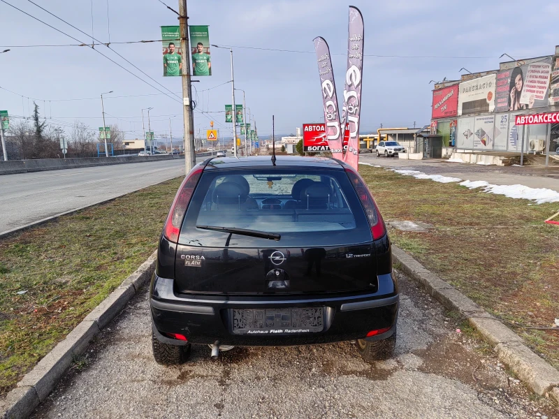 Opel Corsa 1.2 i  80ps, снимка 7 - Автомобили и джипове - 49298857