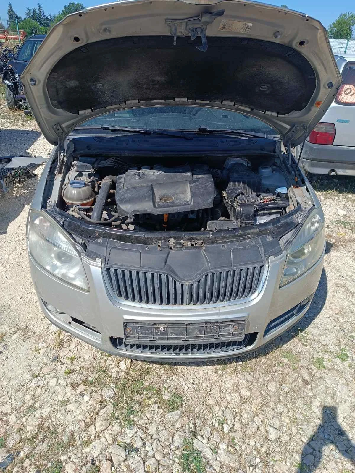 Skoda Roomster 1.4tdi, снимка 5 - Автомобили и джипове - 55458537