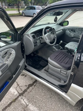 Suzuki Grand vitara 1.6i - 5000 € / 9779.15 лв. - 49863670 11