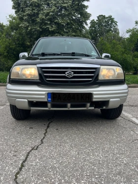 Suzuki Grand vitara 1.6i - 5000 € / 9779.15 лв. - 49863670 2