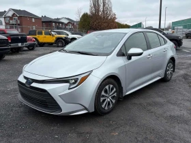 Toyota Corolla * Hybrid * KEYLESS * ПОДГРЕВ * КАМЕРА - 21300 € / 41659.18 лв. - 42251068 10