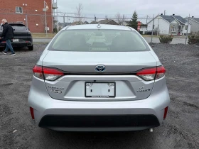 Toyota Corolla * Hybrid * KEYLESS * ПОДГРЕВ * КАМЕРА - 21300 € / 41659.18 лв. - 42251068 4