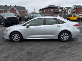 Toyota Corolla * Hybrid * KEYLESS * ПОДГРЕВ * КАМЕРА - 21300 € / 41659.18 лв. - 42251068 11