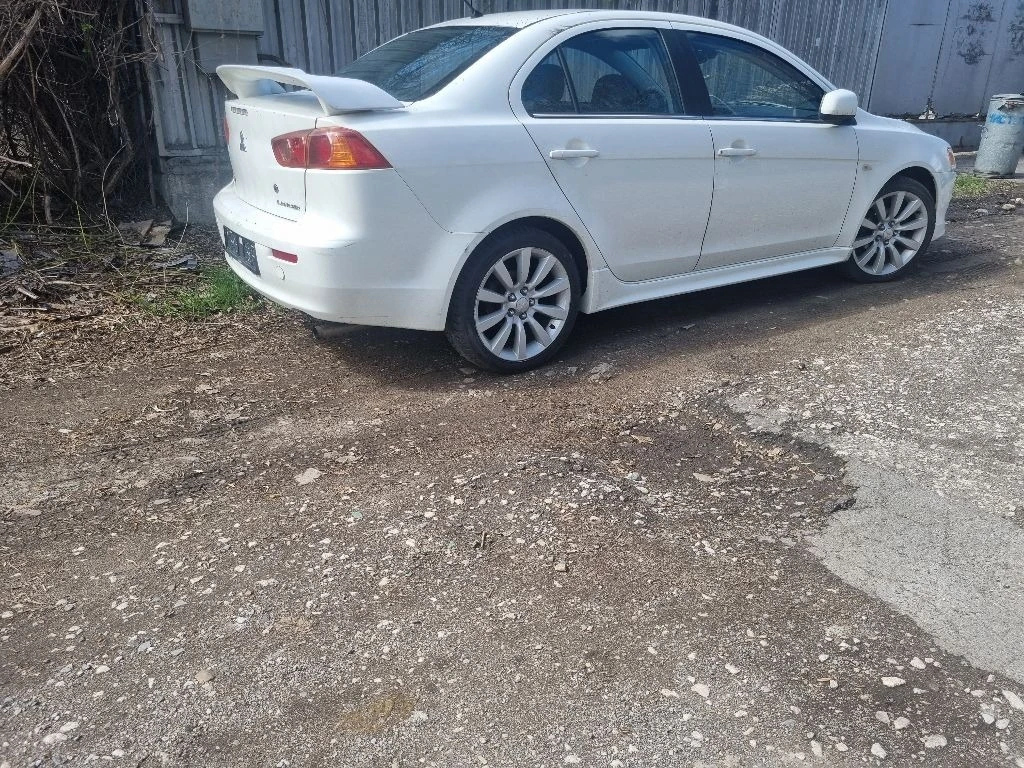 Mitsubishi Lancer 1.8 MIVEC и 1.5  - изображение 2